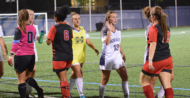 The women's soccer team shows sportsmanship after a recent match versus Albright College.