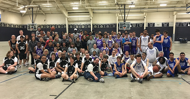 Participants and Moravian student-athlete volunteers after the 6th Annual Special Olympics Basketball Tournament in Timothy Breidegam Field House on April 22.