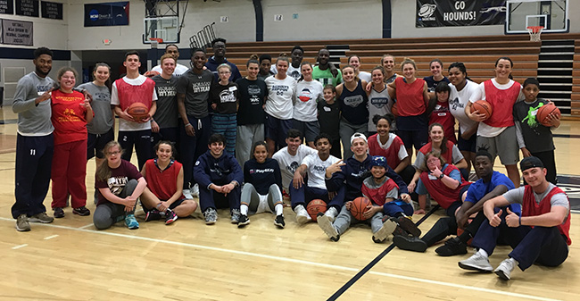 Members of the Moravian College men's and women's basketball teams with the participants of the Via Basketball Clinic.