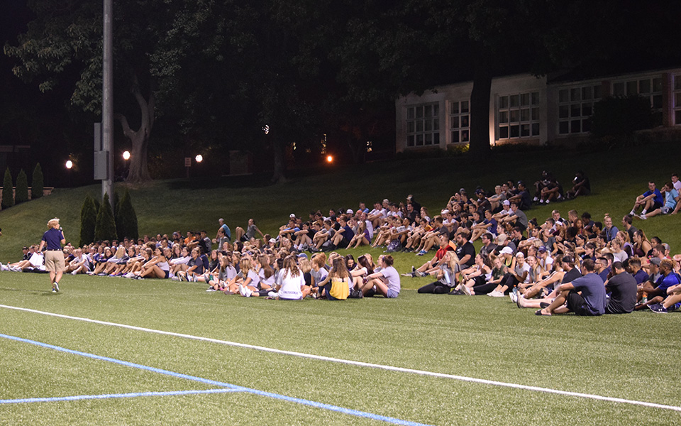 Director of Athletics & Recreation and Head Women's Basketball Coach addresses Moravian's student-athletes during the 2018-19 SAAC Kickoff event in August 2018 on John Makuvek Field.