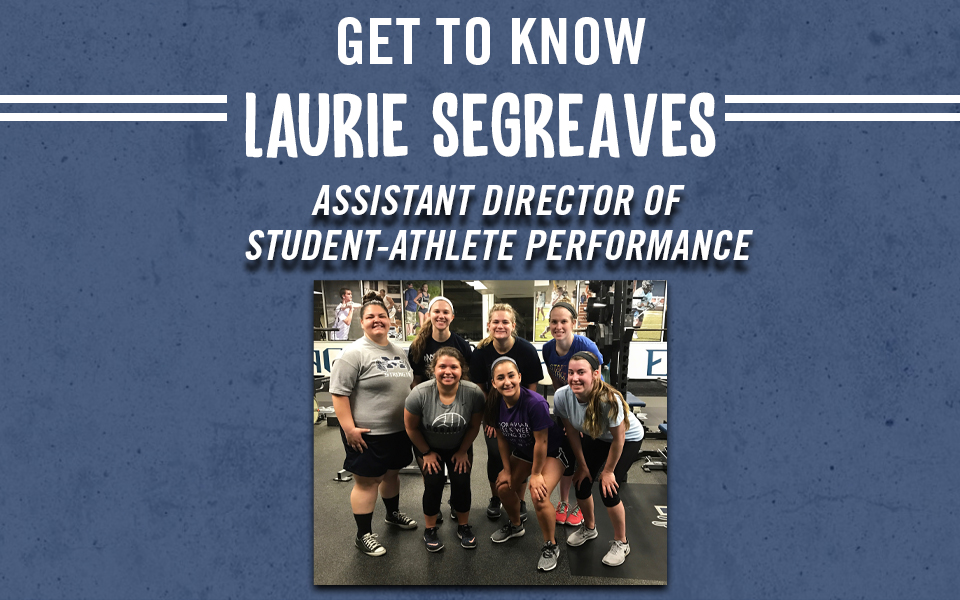 laurie segreaves in the performance center with the women's volleyball team.