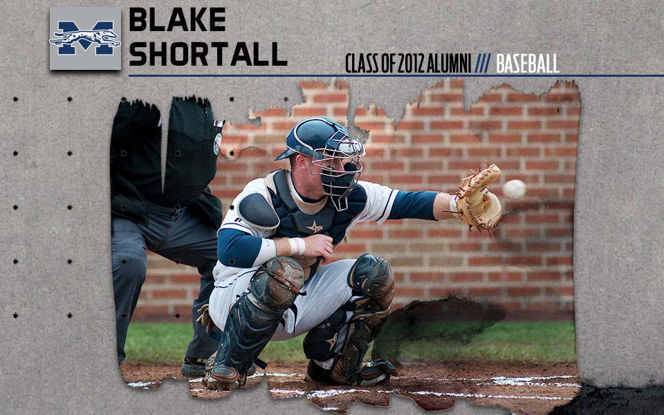 Blake shortall catching a pitch at Gillespie field.