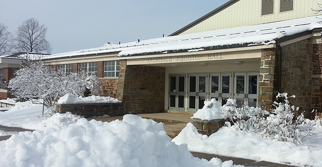 Johnston Hall exterior under snow