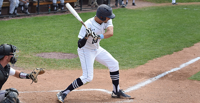 Mike Mittl '19 looks at a pitch during a game at Gillespie Field during the 2017 season.