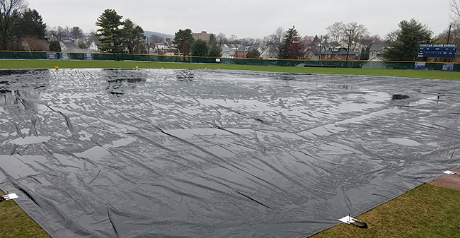 Gillespie Field cover by a new full infield tarp.