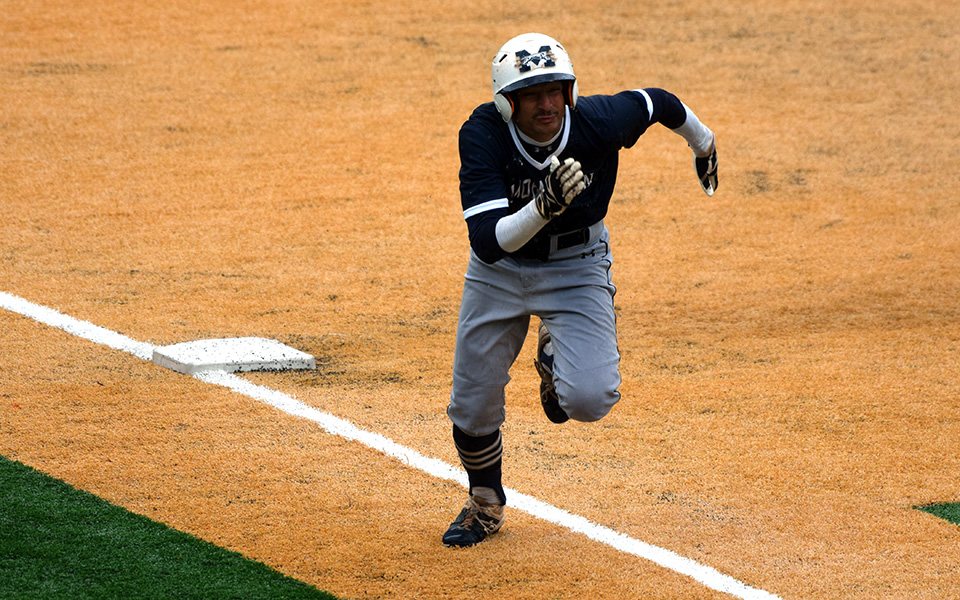 Junior Carmine Palummo races home on a sacrifice fly to score Moravian's first run of the championship round versus Susquehanna University in the 2019 Landmark Conference Championship at Scranton.