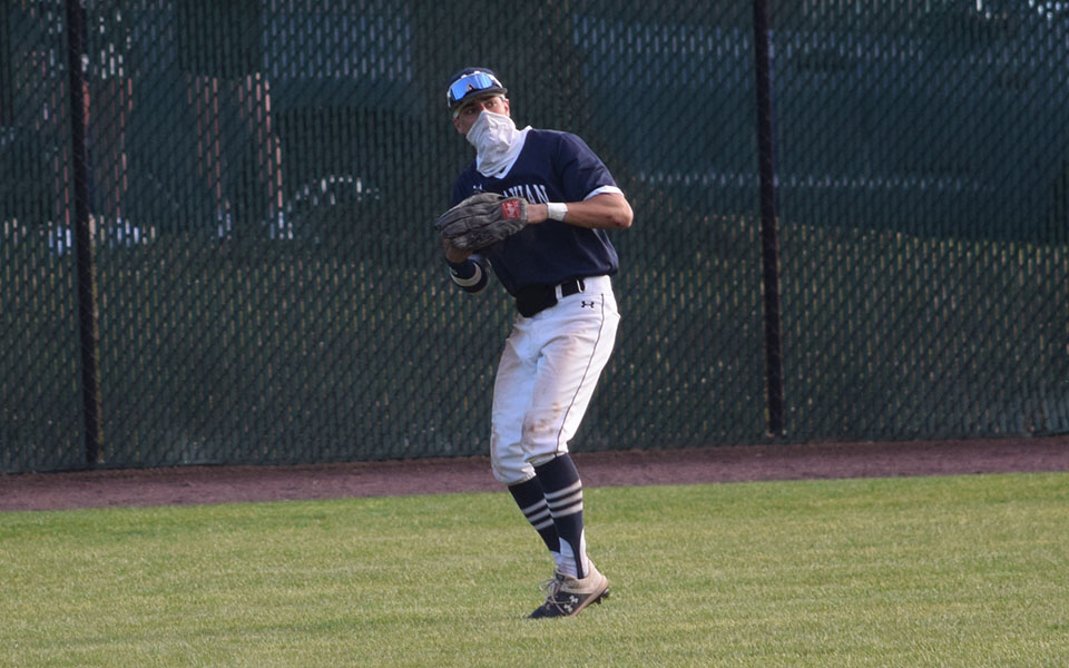 Carmine Palummo '21 gets set to throw the ball back to the infield after catching a fly ball in left field versus Keystone College at Gillespie Field.