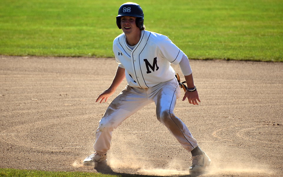 Senior center fielder Matt Madigan leads off first base early in a non-conference game versus Keystone College at Gillespie Field. Photo by Marissa Williams '26