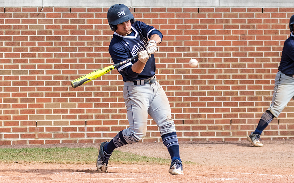 Junior outfielder David Olsakowski swings at a pitch during a game versus Susquehanna University at Gillespie Field during the 2023 season. Photo by Cosmic Fox Media / Matthew Levine '11