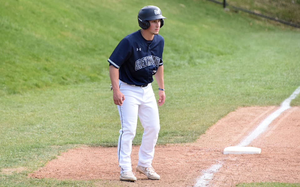 Senior left fielder David Olsakowski leads off third base in the second game of a doubleheader versus Lycoming College at Gillpesie Field.