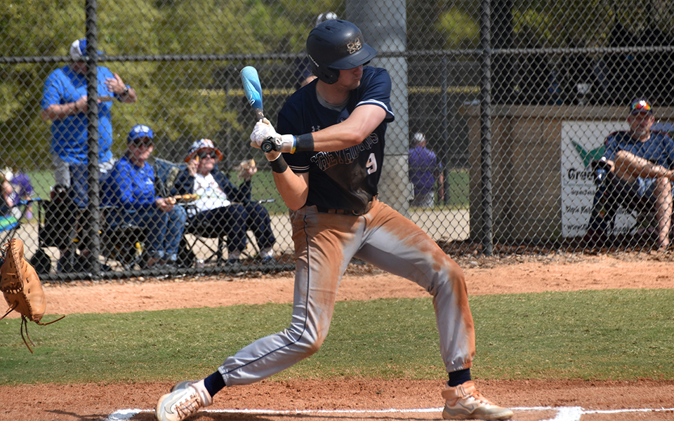 Senior shortstop Paul Croyle swings early in the second game of a doubleheader versus Marymount (Va.) University in the RussMatt Invitational at Lake Myrtle Park in Auburndale, Florida. Photo by Christine Fox