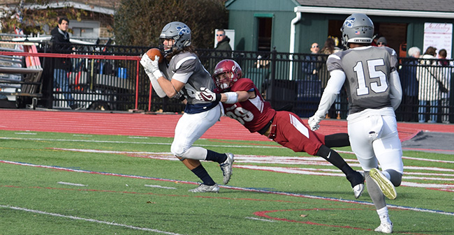 Nick Zambelli '19 intercepts a pass early in the third quarter at Muhlenberg College.