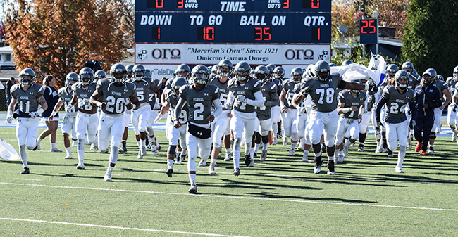 The Greyhounds run onto the field prior to the 2016 finale versus rival Muhlenberg College.