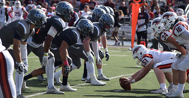 The Greyhounds' special teams group lines up to attempt a punt block against Susquehanna University.