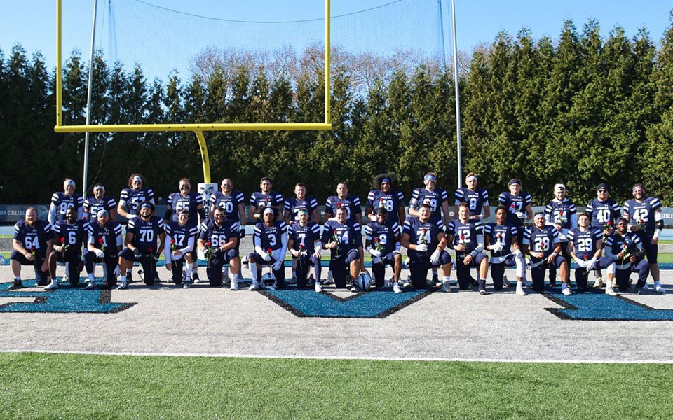 The Greyhound seniors prior to kickoff and the Senior Day celebration at Rocco Calvo Field. Photo by Ashly Hacker '25.