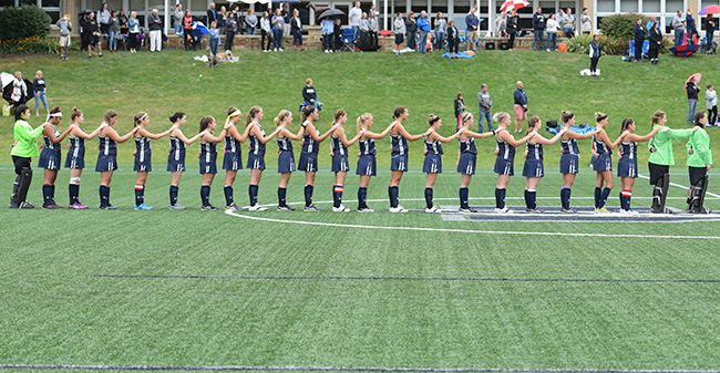The Greyhounds line-up for the national anthem prior to the 2017 season opener versus DeSales University.