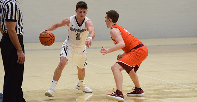 Will Brazukas '19 looks to bring the ball up the court against Susquehanna University.