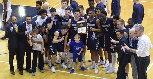 The Greyhounds with the 2018 Landmark Conference Championship plaque after an 81-78 victory at Juniata College.
