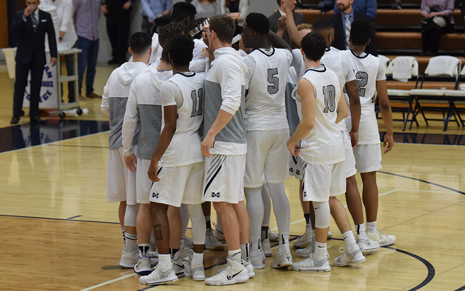 The Greyhounds huddle before the start of the 2018 Landmark Conference Semifinal game versus Drew University in Johnston Hall.