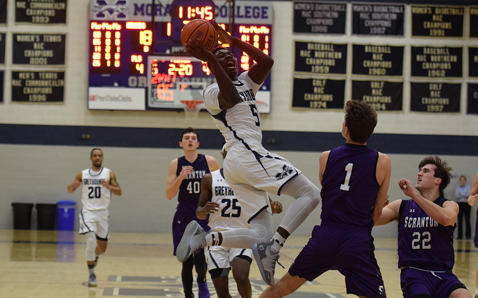 Oneil Holder goes up for a lay-up in the first half versus The University of Scranton in Johnston Hall.