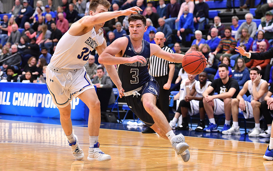 Senior guard Will Brazukas drives towards the basket in the first half versus Hamilton College in the NCAA Division III Tournament Second Round.