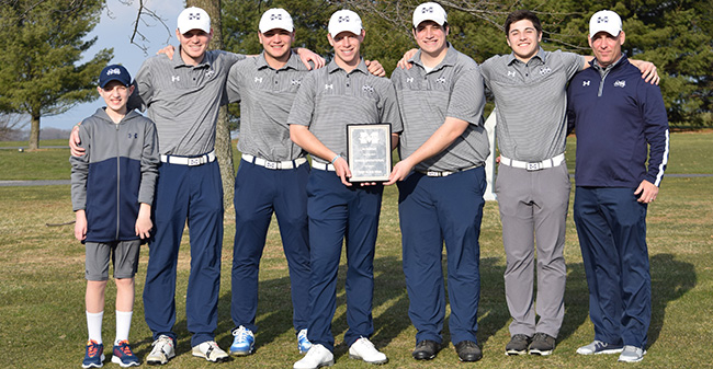 The Greyhounds pose with the first place plaque after winning the Moravian Spring Invitational at Southmoore Golf Course.