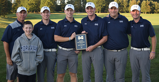 Head Coach Kevin Edwards & his son Justin pose with Nick Kuhn '20, Tyler Smith '18, Joe Rochelle '19, Kevin Kunkle '18 and Kody Long '19 after winning the Moravian Fall Invitational.