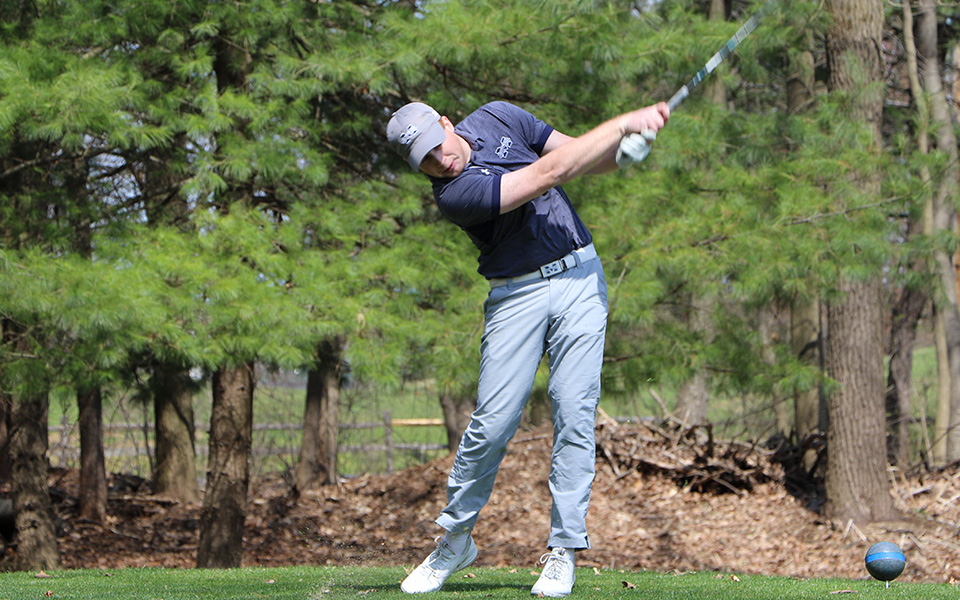 Junior Nick Kuhn tees off during the Moravian Spring Invitational at Southmoore Golf Course.