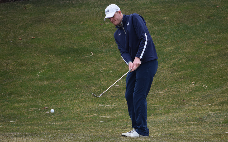 Joe Rochelle chips onto a green during the 2018 Moravian Spring Invitational at Southmoore Golf Course.