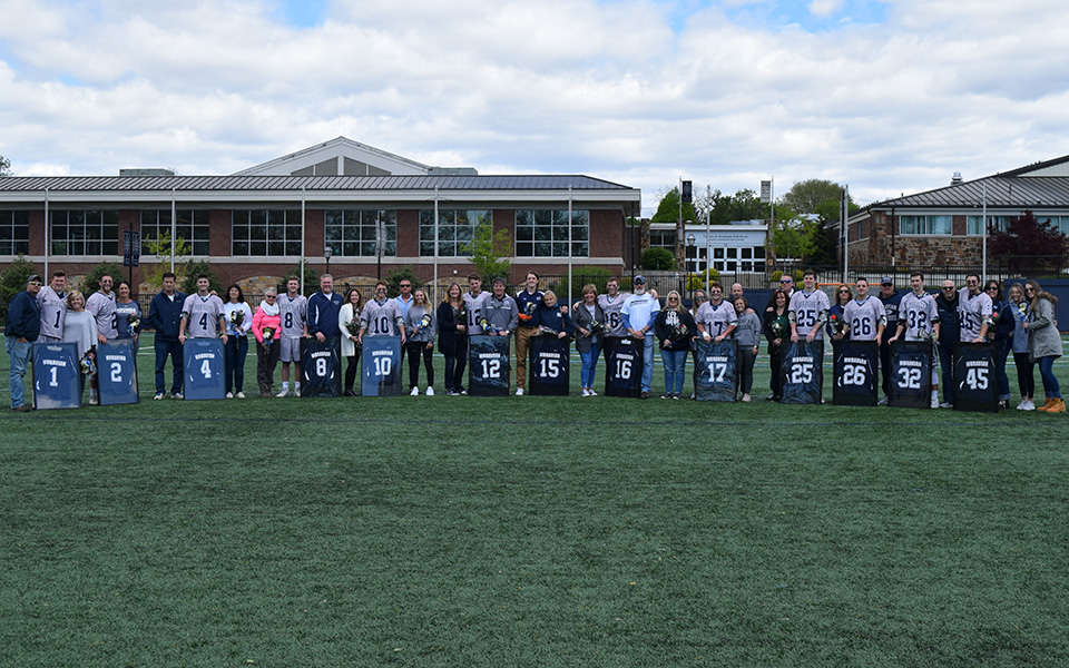 The Greyhounds Class of 2019 seniors with their parents at the pregame ceremony before the season finale versus The University of Scranton on John Makuvek Field.