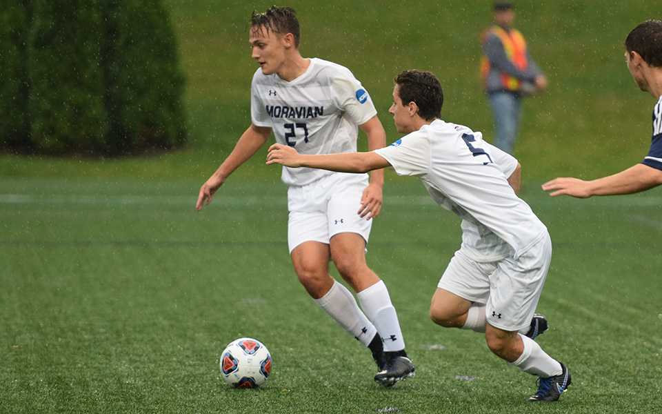 Ethan Blakely and David Durski play a ball during a match versus Centenary (N.J.) University in 2017.
