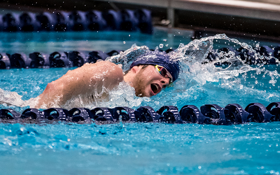 Sophomore Harrison Ziegler competes in a dual meet with Immaculata University at Liberty High School during the 2021-22 season. Photo by Cosmic Fox Media / Matthew Levine '11
