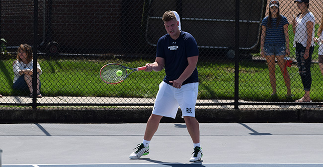Chris Csencsits '20 competes in doubles action against Delaware Valley University.
