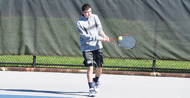 Peter Demyan '19 competes against Goucher College in April 2017.