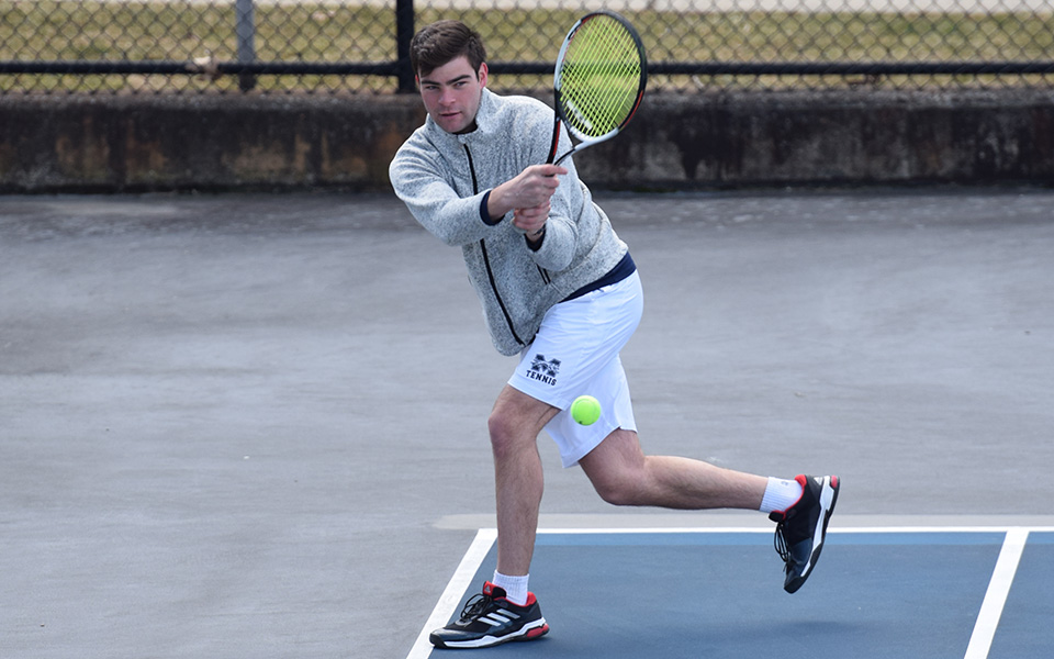 Luke Peterson competes in doubles action versus Rutgers-Camden on Hoffman Courts.