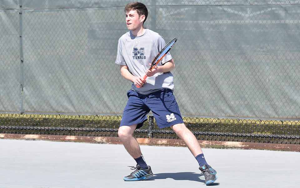 Senior Peter Demyan waits for a shot during doubles action versus Elizabethtown College on Hoffman Courts.