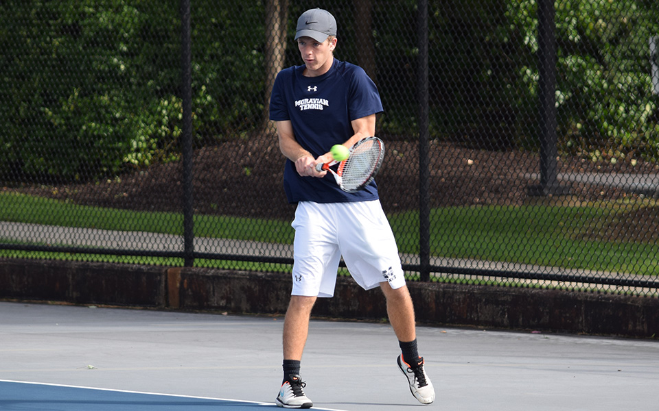 Sophomore Mason Hudnall returns a shot during doubles action versus FDU-Florham in the fall 2018 season on Hoffman Courts.