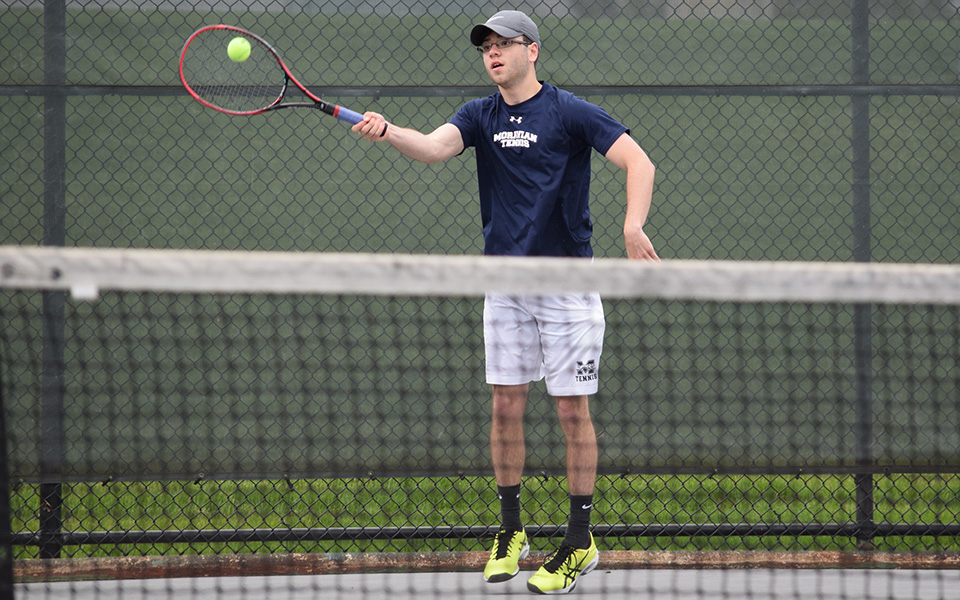 Sophomore Sean Kearns returns a shot in doubles action versus King's College at Hoffman Courts.
