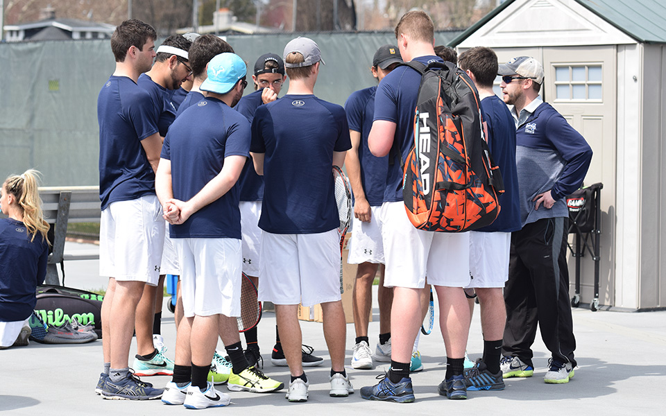 The Greyhounds huddle before the start of a Landmark Conference match versus Goucher College at Hoffman Courts.