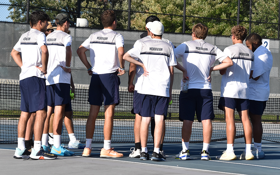 The Greyhounds talk after a match at Hoffman Courts this season.
