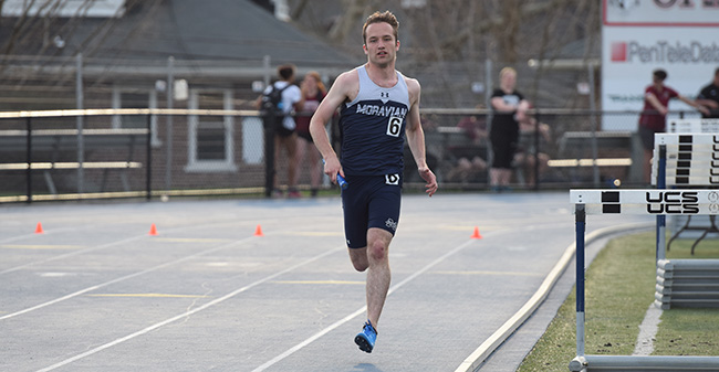 Mike Kopach '18 runs in the 4x400-meter relay at the Coach P Invitational on Timothy Breidegam Track.