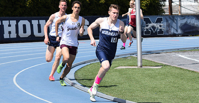 Andrew Mitchell '18 runs in the 1,500 meters during the Greyhound Invitational at Timothy Breidegam Track.