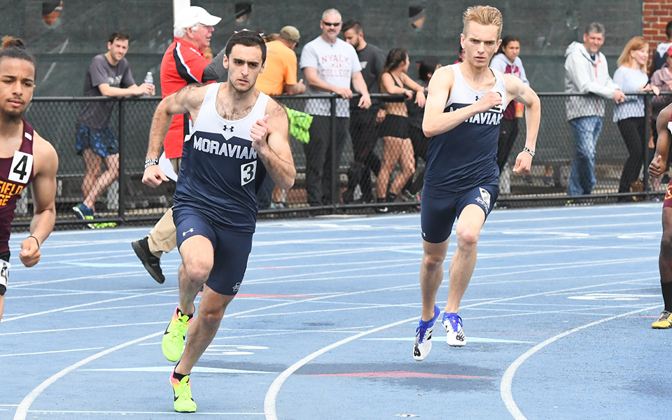 Senior Devon Harris and sophomore Peter Gingrich compete in the 800-meter run during the Greyhound Invitational at Timothy Breidegam Track.