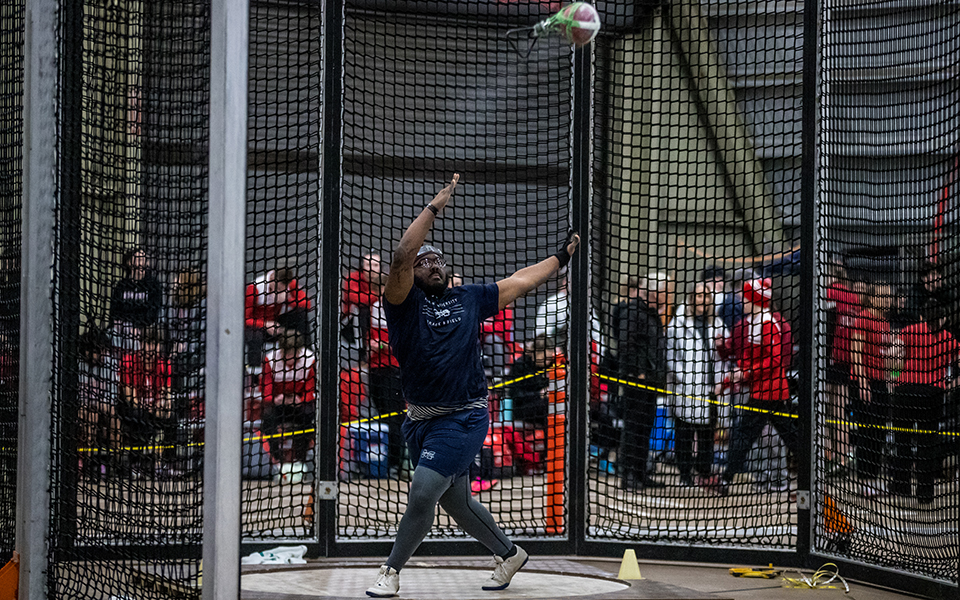Graduate student Tim King competes in the weight throw at the Moravian Indoor Meet at Lehigh University's Rauch Fieldhouse. Photo by Cosmic Fox Media / Matthew Levine '11