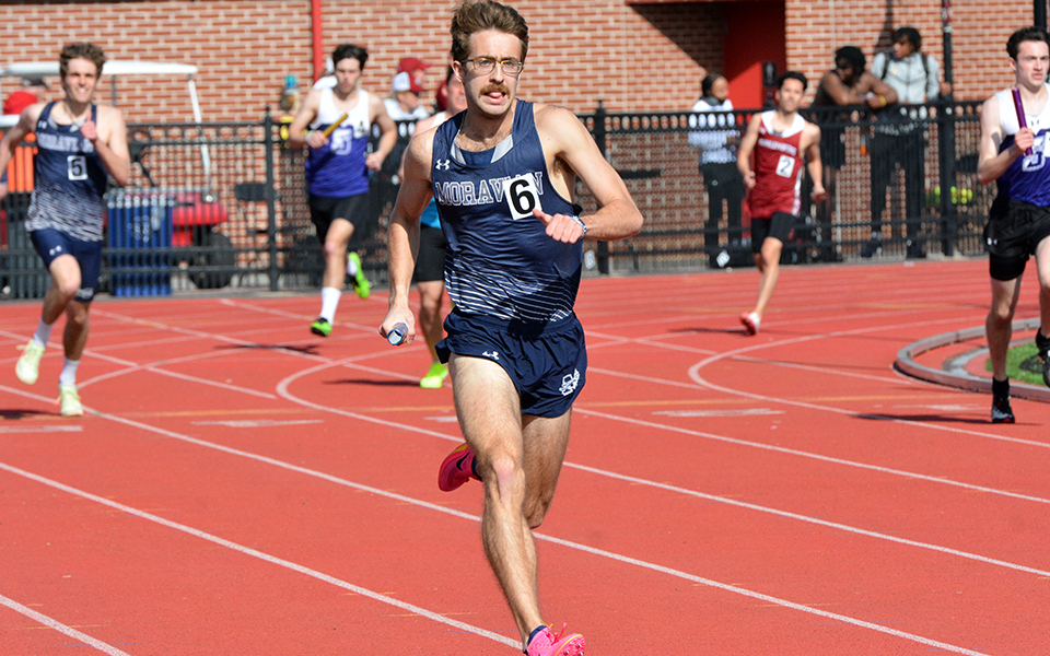 Sophomore Geoffrey Kleinberg runs in the 4x400-meter relay during the Muhlenberg College Invitational earlier this season. Photo courtesy of Muhlenberg College Sports Information