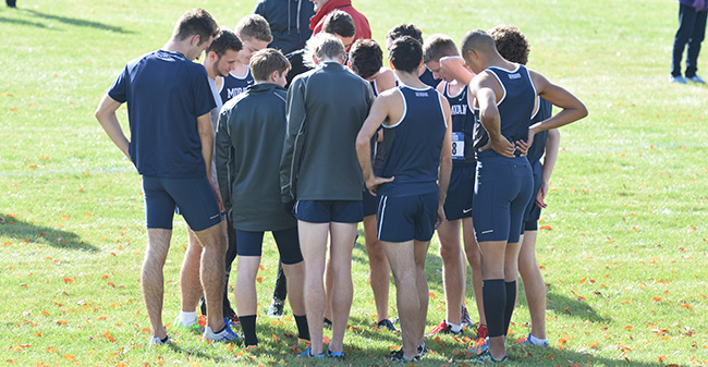 The Hounds huddle before the start of the 2016 Landmark Conference Championship at Bicentennial Park