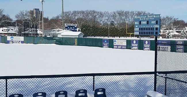 Blue & Grey Field sits under a blanket of snow after a winter storm on March 21, 2018.