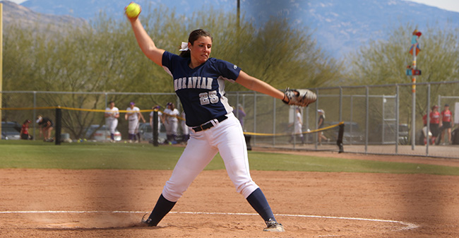 Josie Novak '18 delivers a pitch during a game versus SUNY Oneonta at the Tucson (Ariz.) Invitational as Novak recorded her 500th career strikeout.