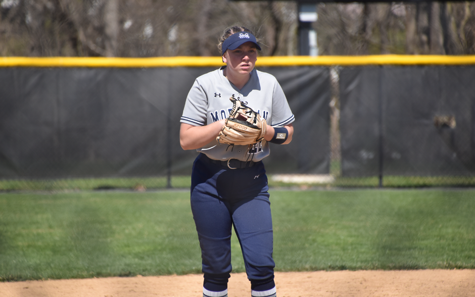 Sophomore third baseman Sydney Andrews gets set in the field in a game at Ursinus College this season. Photo by Christine Fox