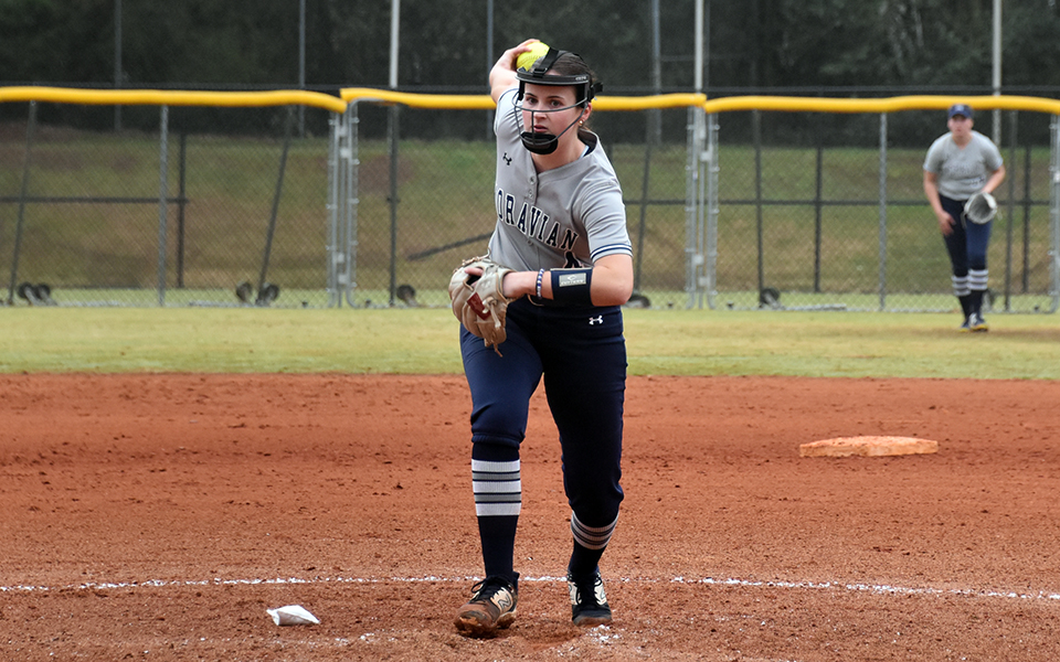 Senior pitcher Madi Cunningham winds up for a pitch versus No. 11 Bethel (Minn.) University at the 2024 National Fastpitch Coaches Association Division III Leadoff Classic in Columbus, Georgia. Photo by Morgan Mercier
